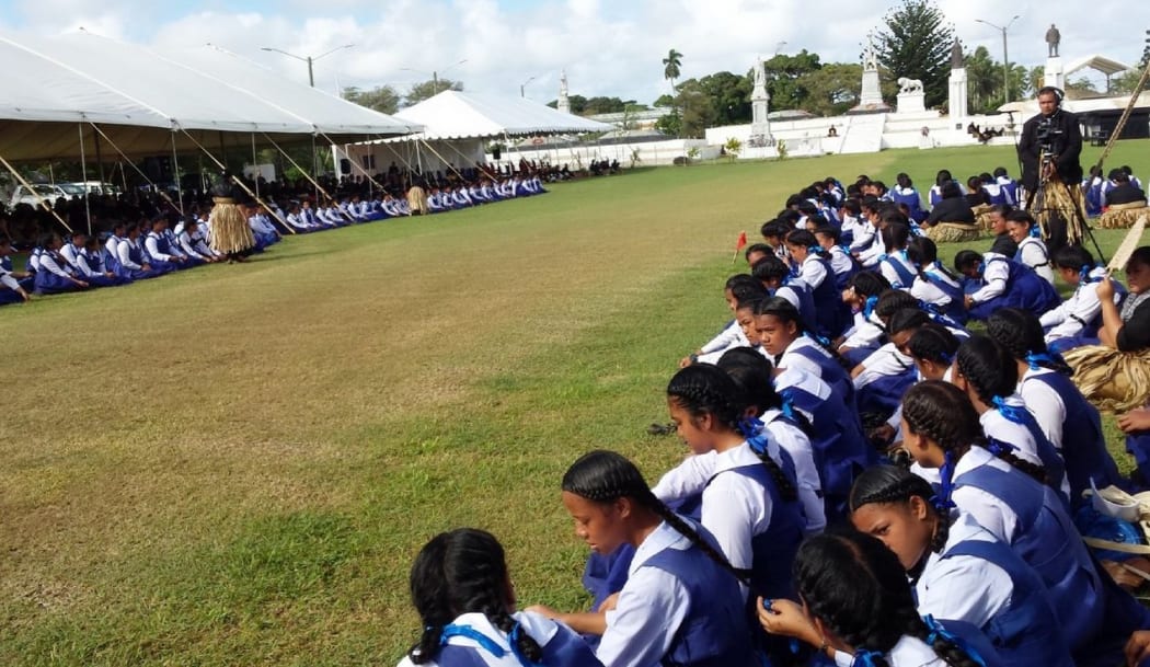 Students gather at the Royal Tombs, Mala'ekula