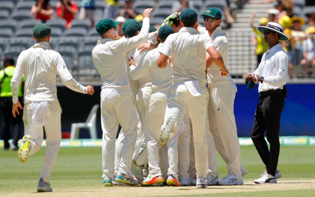 Australia celebrate victory over India in the second test in Perth.