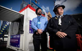 Community Patrols of New Zealand's Gurdeep Talwar and Māori Warden Joanne Paikea stand in front of the safety hub in Queens Wharf. Photo / Jason Oxenham