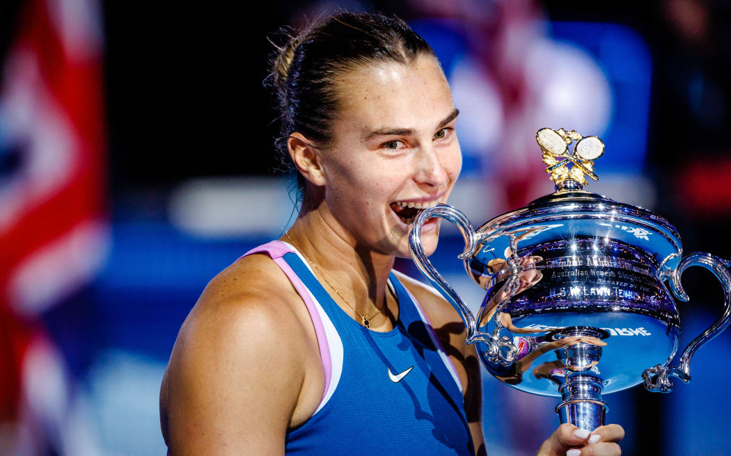 Belarusian Aryna Sabalenka (WTA 5) celebrates with the trophy after winning a Women's Singles final match between Russian Rybakina and Belarusian Sabalenka at the 'Australian Open' tennis Grand Slam, Saturday 28 January 2023 in Melbourne Park, Melbourne, Australia. 
BELGA PHOTO PATRICK HAMILTON (Photo by PATRICK HAMILTON / BELGA MAG / Belga via AFP)