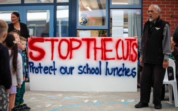 Supporters at Arakura School call for free school lunches to continue