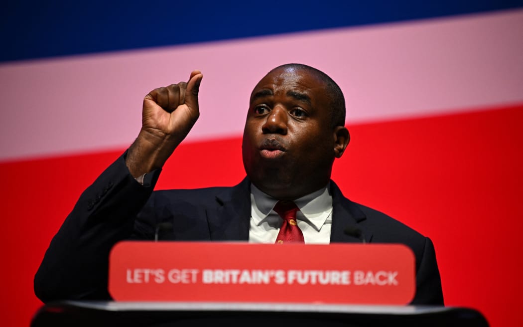 Britain's main opposition Labour Party Shadow Foreign Secretary David Lammy addresses delegates on the second day of the annual Labour Party conference in Liverpool, northwest England, on October 9, 2023. (Photo by Paul ELLIS / AFP)