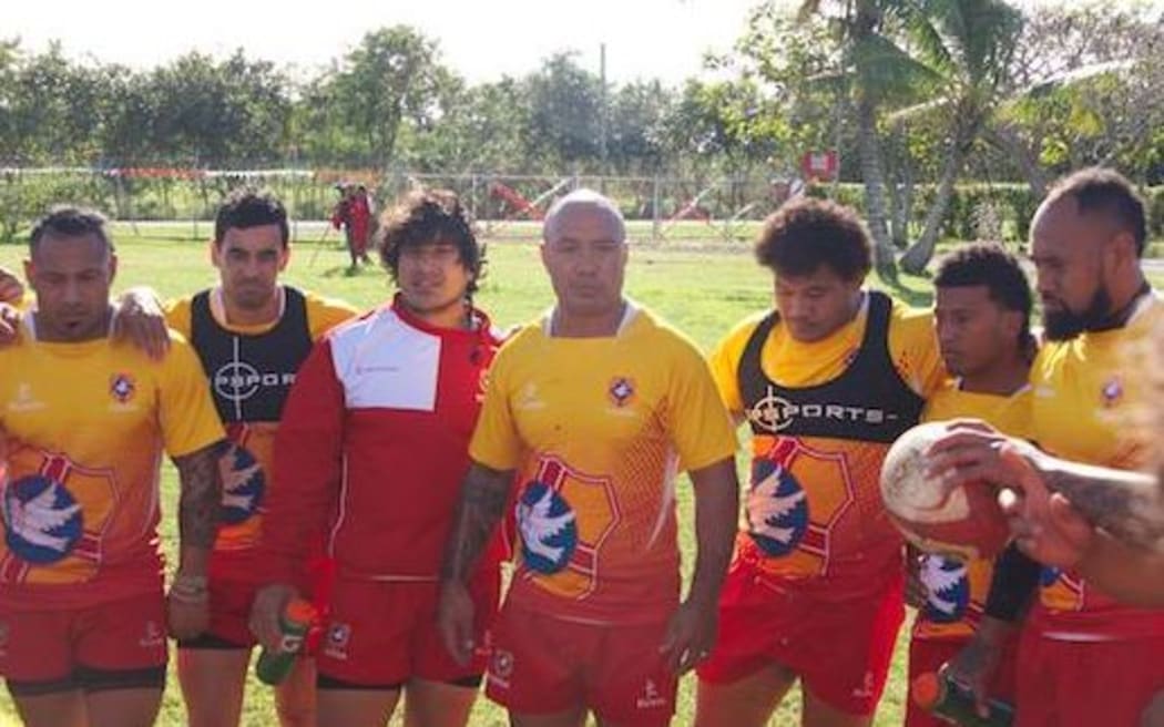 'Ikale Tahi captain Nili Latu leads a huddle during training.