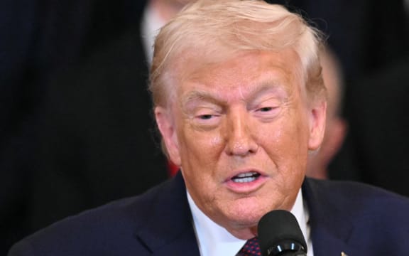 US President Donald Trump speaks during a ceremony to congratulate the Florida Panthers of the National Hockey League, winners of the 2025 Stanley Cup, in the East Room of the White House in Washington, DC on January 15, 2026. (Photo by Mandel NGAN / AFP)