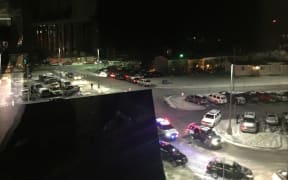 Cars are seen on the streets from Kodiak High School in Kodiak City, Alaska on January 23, 2018 as people evacuate following a strong earthquake of 7.9 magnitude centered in the Gulf of Alaska struck the region, generating small tsunami waves along the south coast of Alaska.