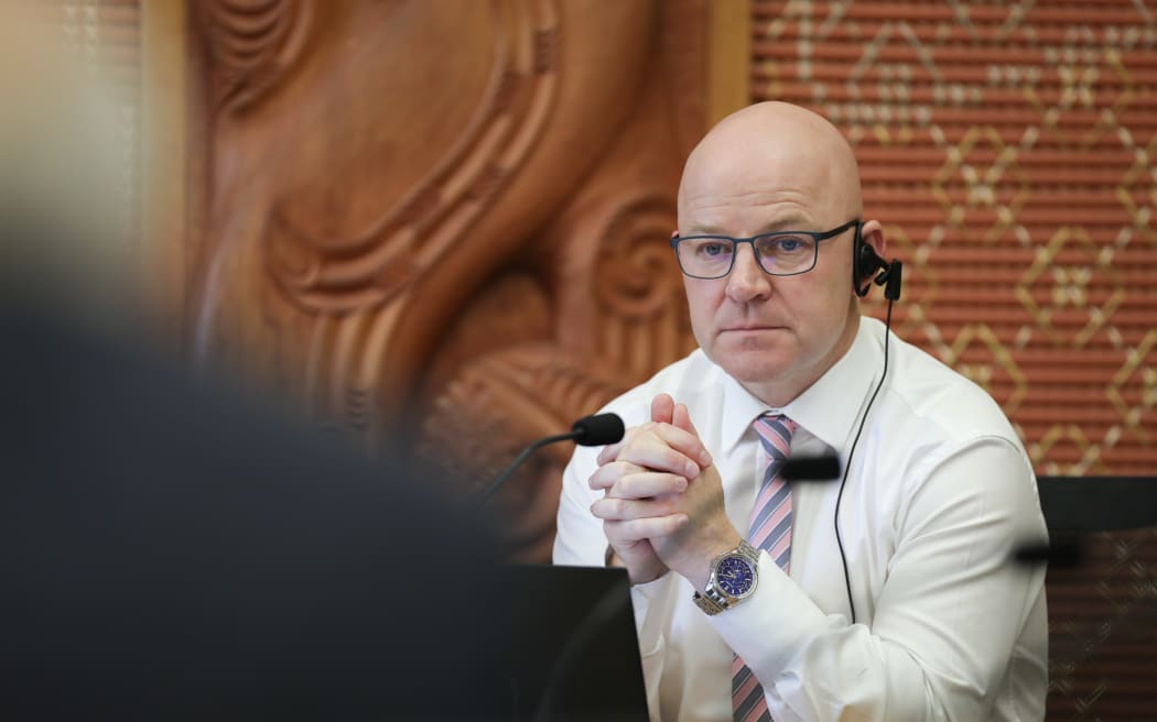 National Whip Matt Doocey in select committee, wearing an ear piece to help communication with online submitters.