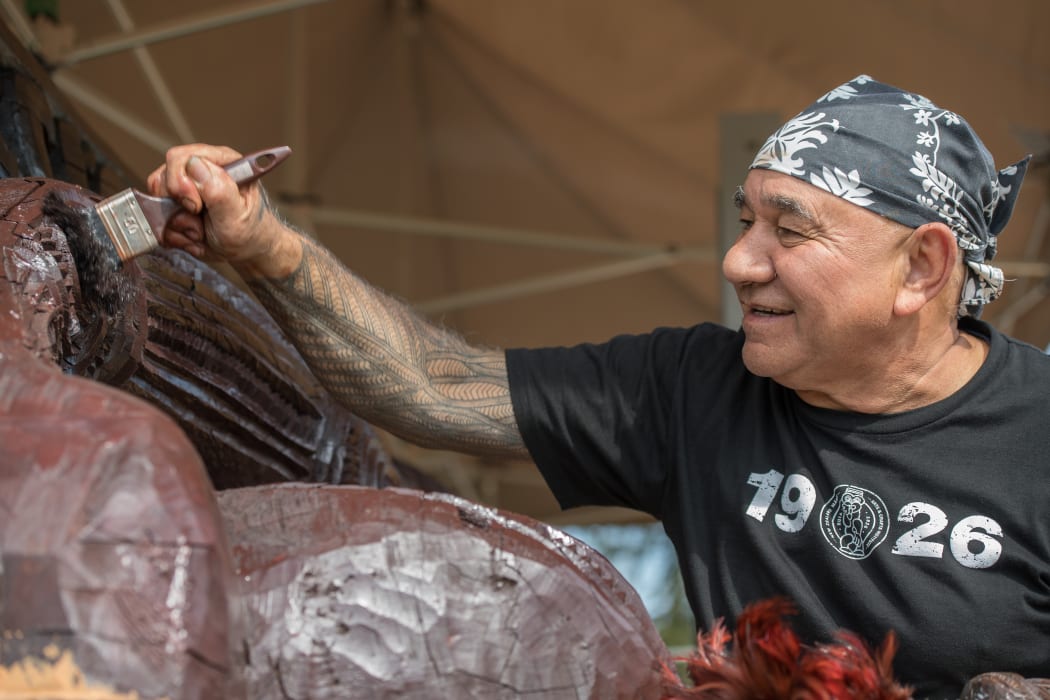 The pou maumahara was carved by master carver James Rickard along with tutors and students over four years.