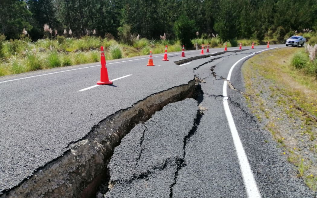 Damage on the road to Kaipara Harbour's remote harbourside community of Tinopai which was initially cut off the outside world by the cyclone's damage.