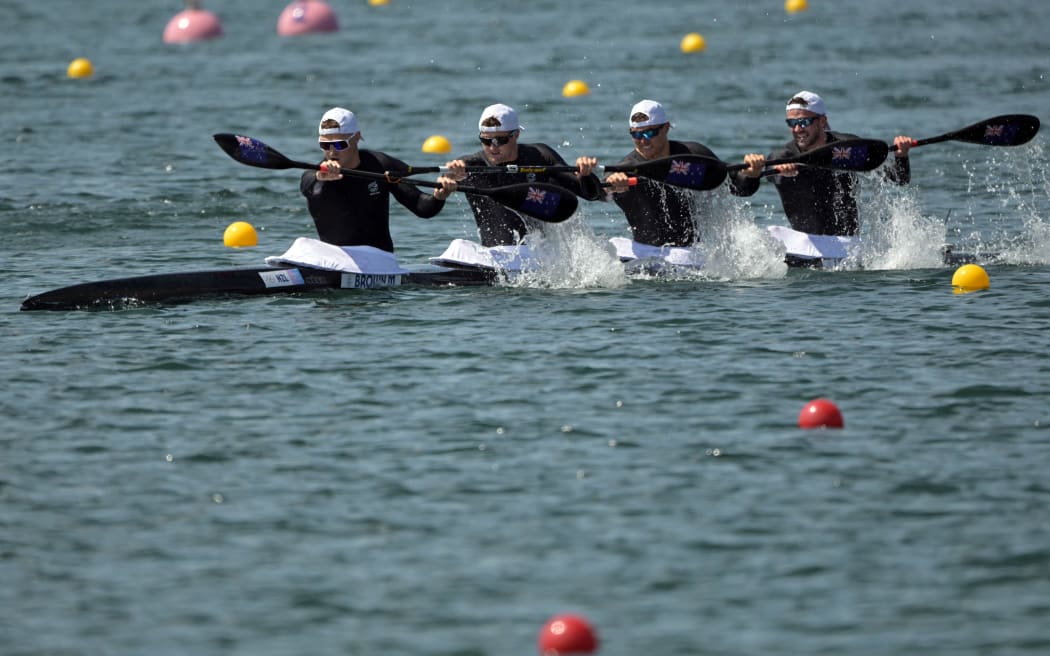 (L-R) New Zealand's Max Brown, New Zealand's Grant Clancy, New Zealand's Kurtis Imrie and New Zealand's Hamish Legarth compete in the men's kayak four 500m quarterfinals of the canoe sprint competition at Vaires-sur-Marne Nautical Stadium in Vaires-sur-Marne during the Paris 2024 Olympic Games on August 6, 2024. (Photo by Bertrand GUAY / AFP)