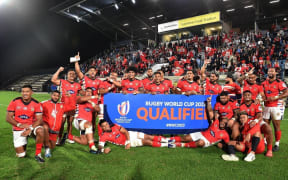 Jubilant Tongan players after they qualified for the 2023 Rugby World Cup