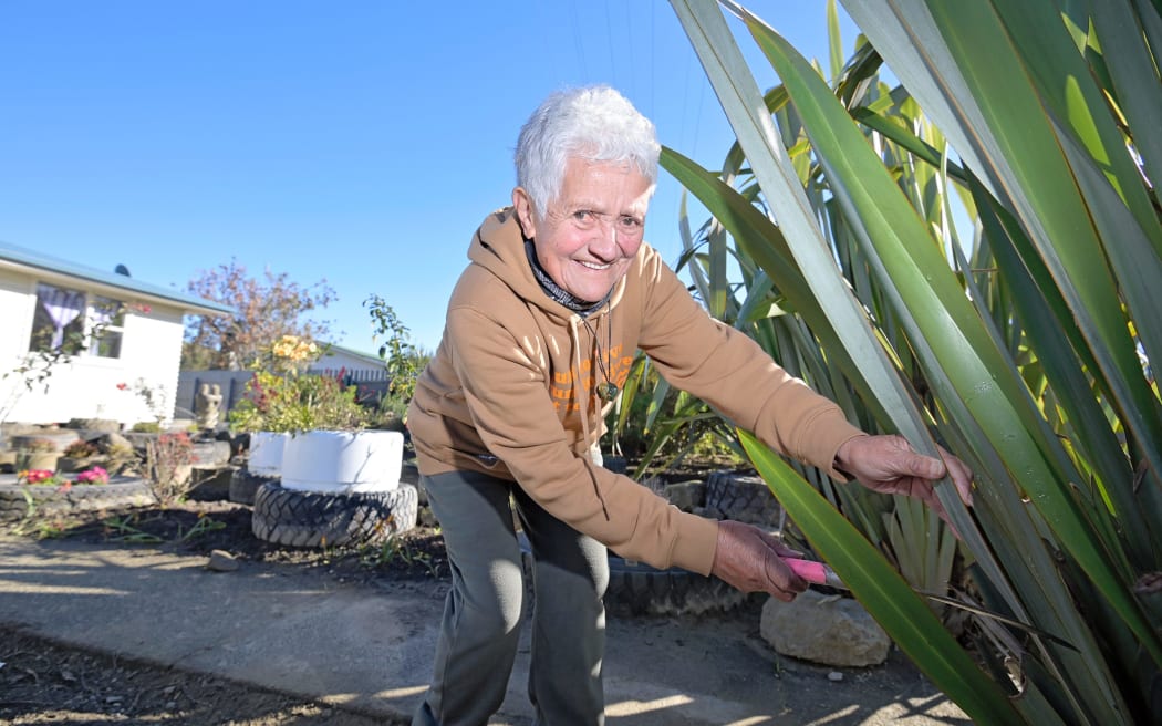 Tahu Dansey-Owen-Ruru is not only a keen weaver, but also gardener. Although most of her plants were ruined in Cyclone Gabrielle, she is slowly recreating her outdoor space with the help of her son, Pitama.