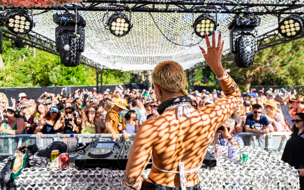 A DJ performs at Two Minds Festival in 2023.