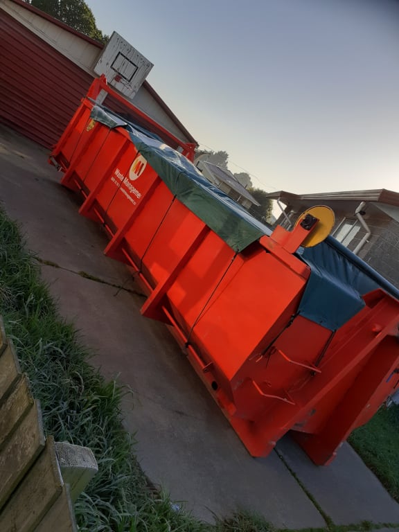 The skip where three-quarters of the family's possessions ended up.