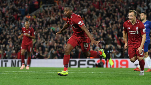 Liverpool's English striker Daniel Sturridge celebrates scoring the opening goal during the English League Cup third round football match against Chelsea at Anfield in Liverpool, north west England on September 26, 2018.