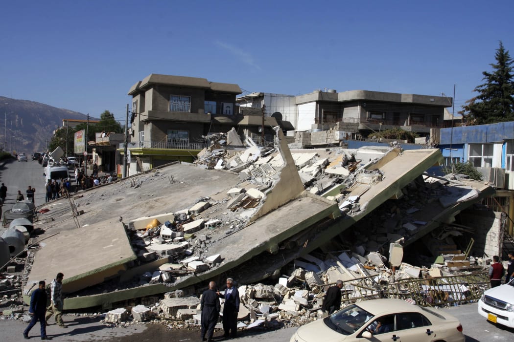 A building in the town of Darbandikhan, in Iraq's Kurdistan region, levelled by the quake.