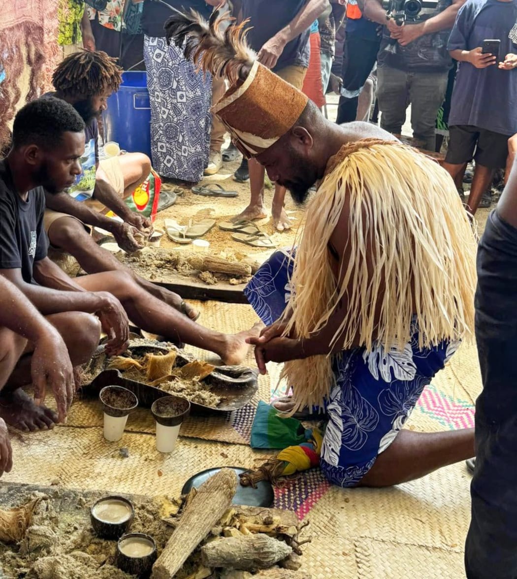 Chief Gureshaba La Roche Mare Nengone Sinewami Wakewi, president of the National Council of Chiefs in New Caledonia (Inaat Ne Kanaky), prepares to receive a traditional preparation of kava at the opening. Pictured on Mar. 5, 2025.