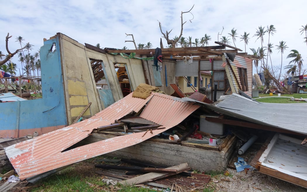 A house cut apart by a flying roof during Cyclone Winston, Fiji