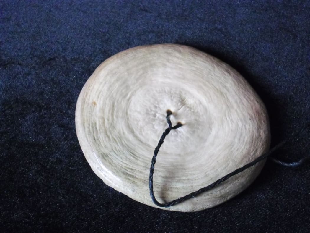 Porotiti upokohue - taonga puoro by Alistair Fraser from a whale vertebra