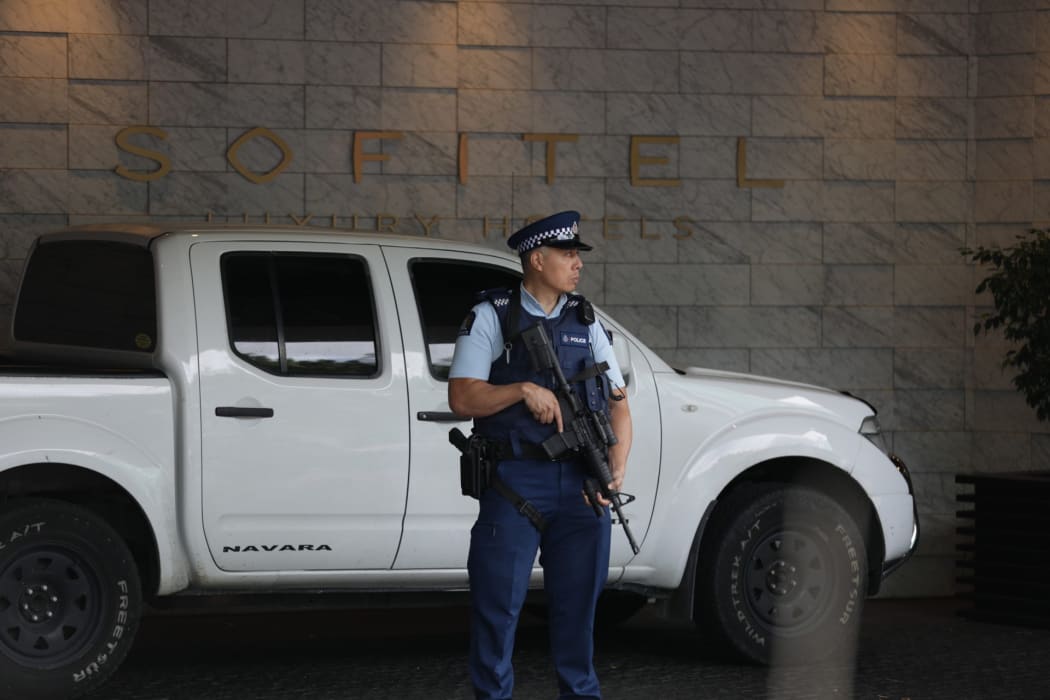 An armed police officer at the Sofitel in Viaduct Harbour, Auckland.