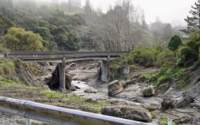 At Waikoau Bridge, huge boulders moved by the floodwater, with slash still built up