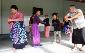 Young Fijians learn the traditional meke seasea dance in Auckland.