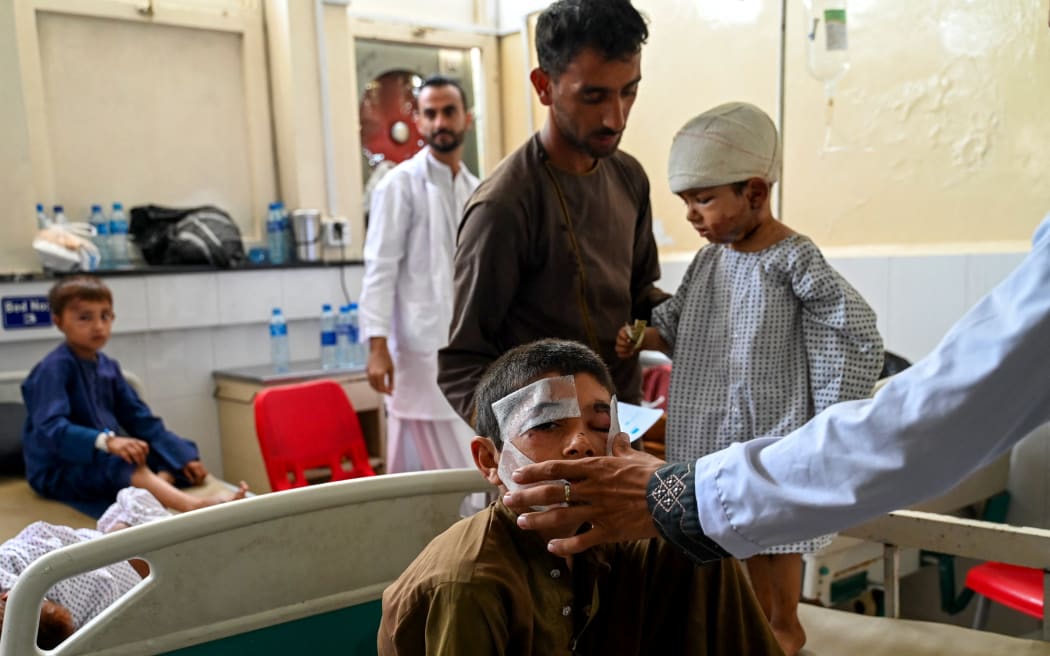 Afghan boys injured during earthquakes receive treatment at a hospital in Jalalabad on 2 September, 2025.