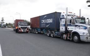 Police teams stop trucks going south from Whangārei to make sure they're not over the weight limits.
