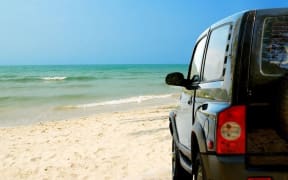 car on beach