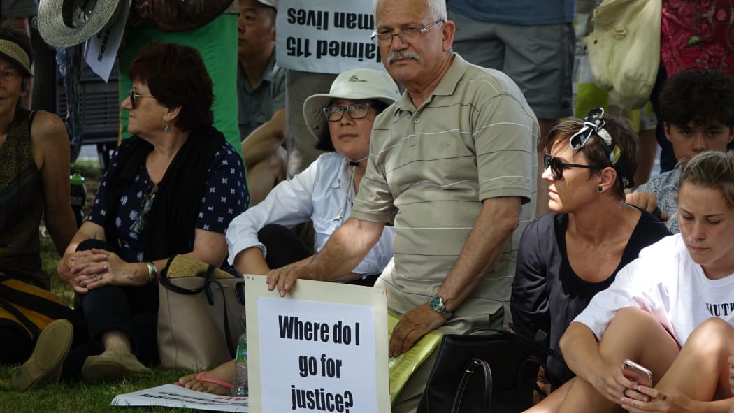 One of the protest organisers Maan Alkaisi (centre).