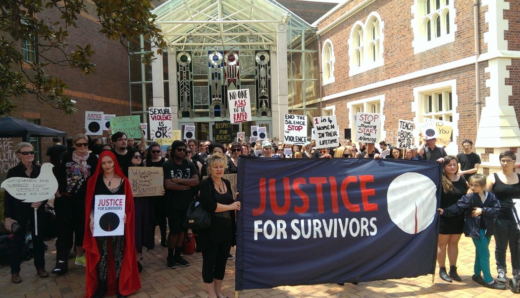 About 200 people protested outside the Auckland High Court on 22 November 2014 over the failure of police to prosecute anyone in connection with a group of teens who boasted online of sex with underage girls.