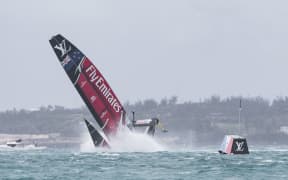 Team NZ's boat capsized during a semi-final race against Britain's BAR.