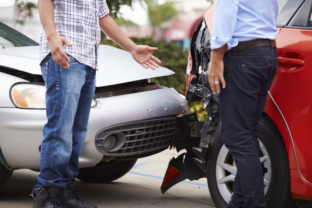 Drivers argue after a car crash (stock photo).