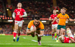 Tom Wright scores for the Wallabies against Australia, 2024.