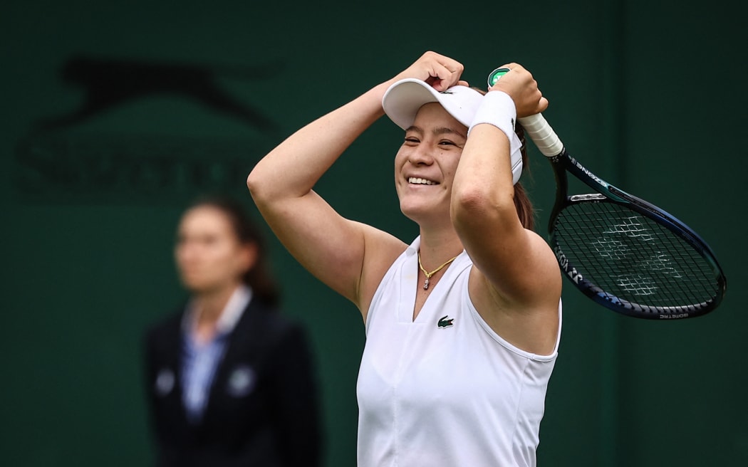 New Zealand's Lulu Sun celebrates winning against China's Zheng Qinwen during their Women's singles tennis match.