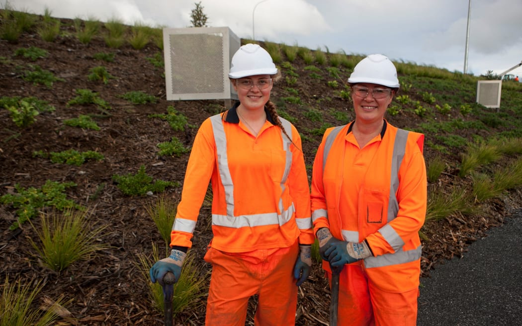 Matia Grace and Miri Okeroa, employees of landscaping company Natural Habitats.