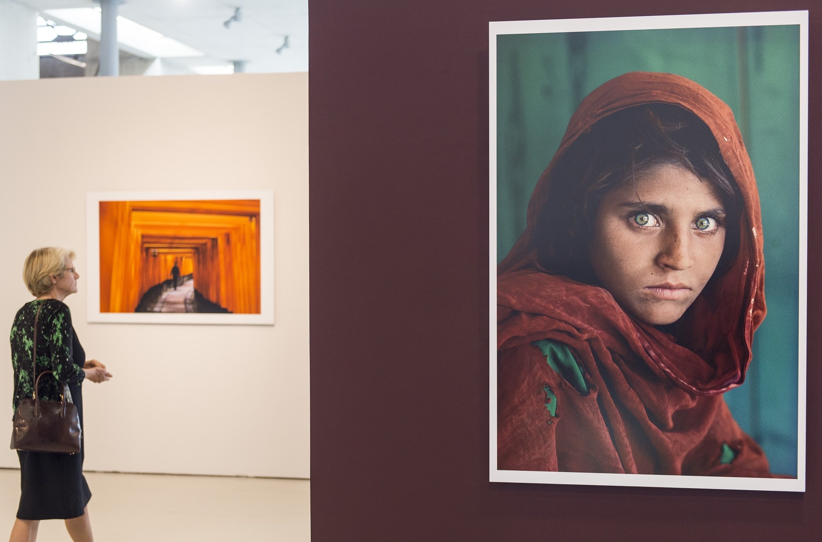 American photographer Steve McCurry's iconic photo 'Afghan Girl', taken of Sharbat Gula in 1985, is displayed at an exhibition in Turkey in 2015.