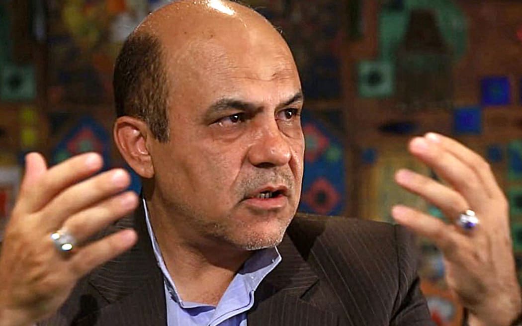 An undated handout picture provided by Khabar Online news agency shows, former Iranian deputy of defence minister, British-Iranian national Alireza Akbari, during an interview in Tehran. - Iran has sentenced Akbari to death after his conviction for spying for British intelligence services, the Islamic republic's judicial news agency reported January 11, 2023. (Photo by Khabar Online / AFP) / === RESTRICTED TO EDITORIAL USE - MANDATORY CREDIT "AFP PHOTO / HO /KHABAR ONLINE" - NO MARKETING NO ADVERTISING CAMPAIGNS - DISTRIBUTED AS A SERVICE TO CLIENTS ===