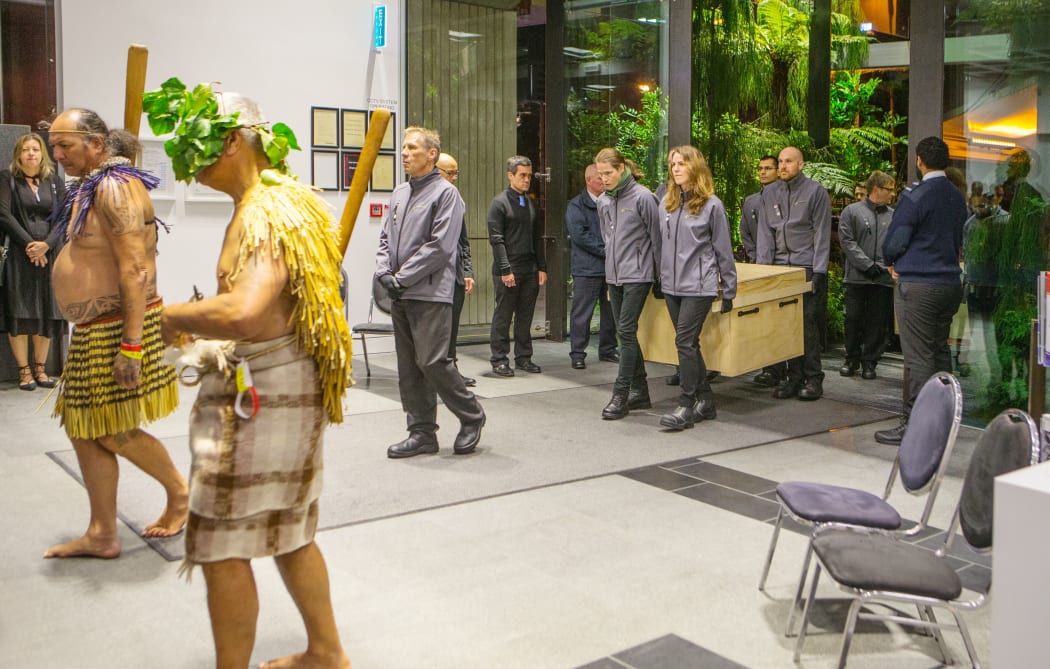 Archives New Zealand staff carry the 1835 Declaration of Independence of the United Tribes of New Zealand - He Whakaputanga o te Rangatiratanga o Nu Tireni - into the National Library of New Zealand.