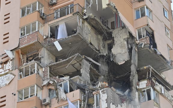 A view of a high-rise apartment block which was hit by recent shelling in Kyiv on February 26, 2022.