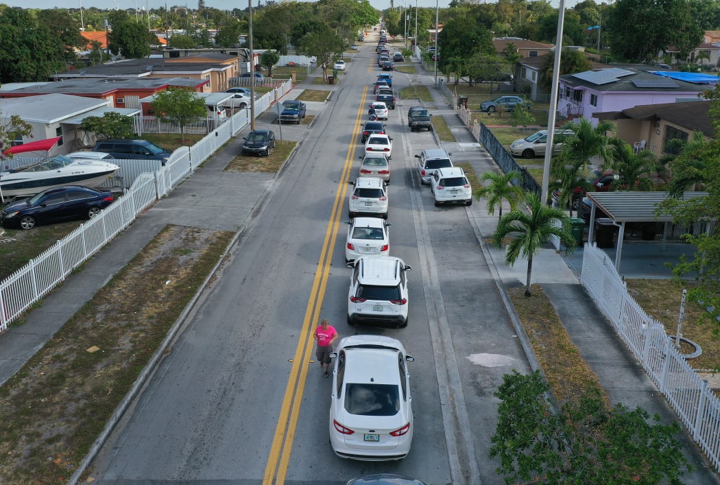 The queue to receive unemployment application papers in the city of Hialeah, Florida, 8 April.