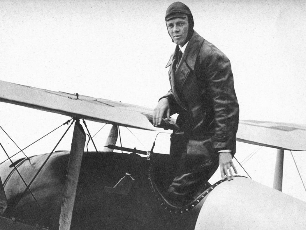 Charles Lindbergh standing by 'Spirit of St Louis'