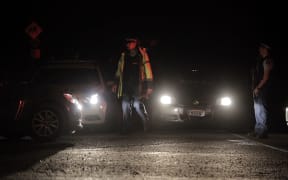 The police cordon at Onepu Springs road this evening.