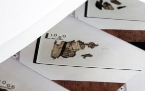 Newspaper and fragments from the scene were identified as coming from a 1977 edition of the Evening Post.