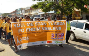 Women march in Honiara to mark the beginning of 16 days of activism for the elimination of violence against Women in 2015.