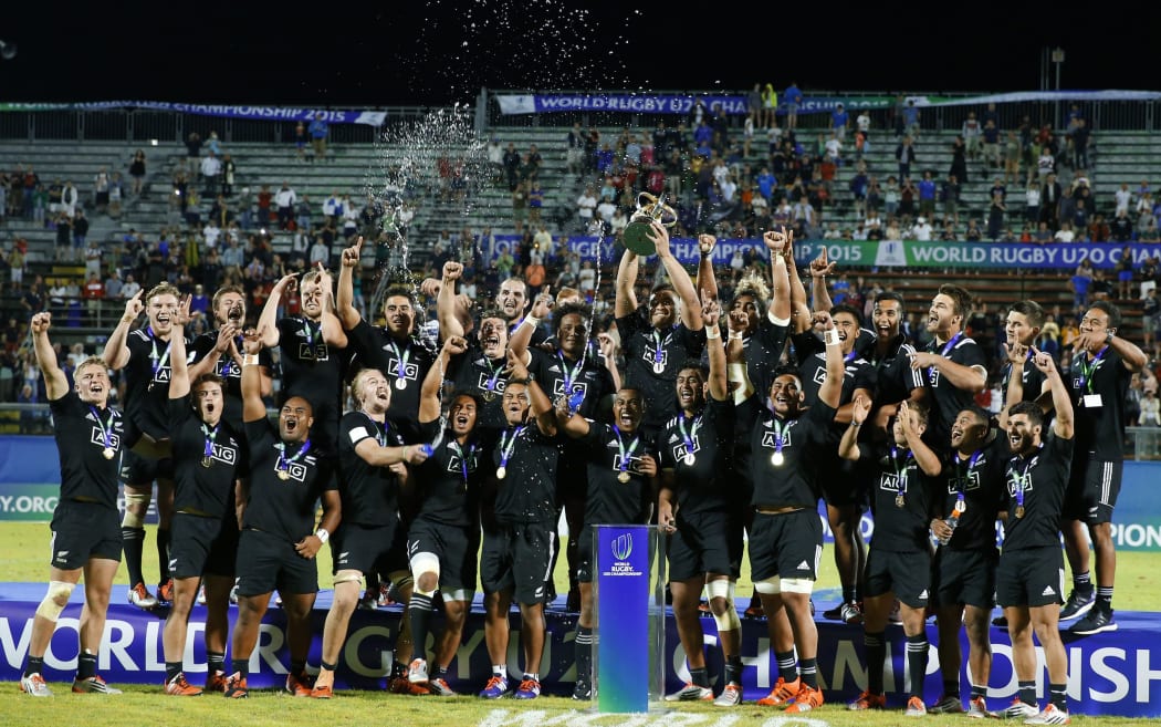 The New Zealand under 20 rugby team celebrate with the World Championship trophy, 2015.