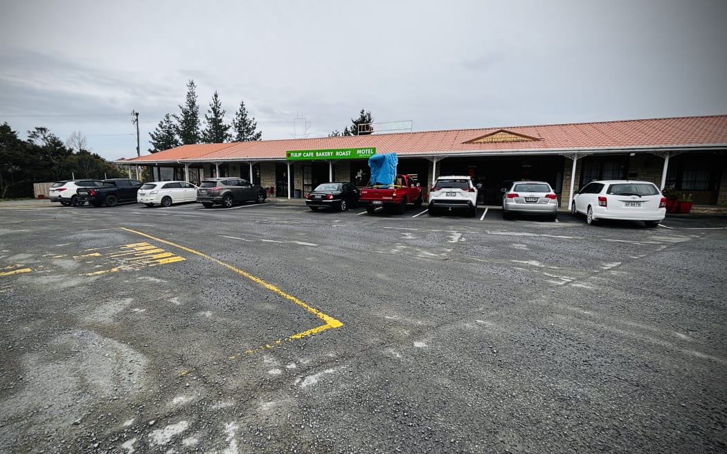 The bus had stopped at this Kaiwaka carpark leading to the Tulip Cafe, Motel.