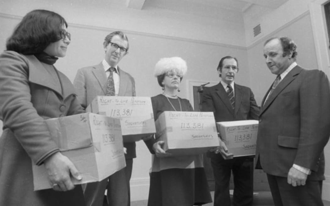 Members of the Society for the Protection of the Unborn Child at parliament with a petition. in 1975. From left to right: Marilyn Pryor, Dr Jack Bergin, Dr Diana Mason (national president) and Des Dalgety.
