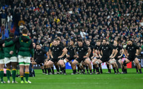 The All Blacks perform the haka before the Rugby World Cup final against South Africa at Stade de France.