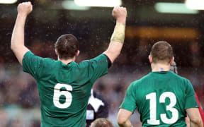 Ireland rugby players celebrate.