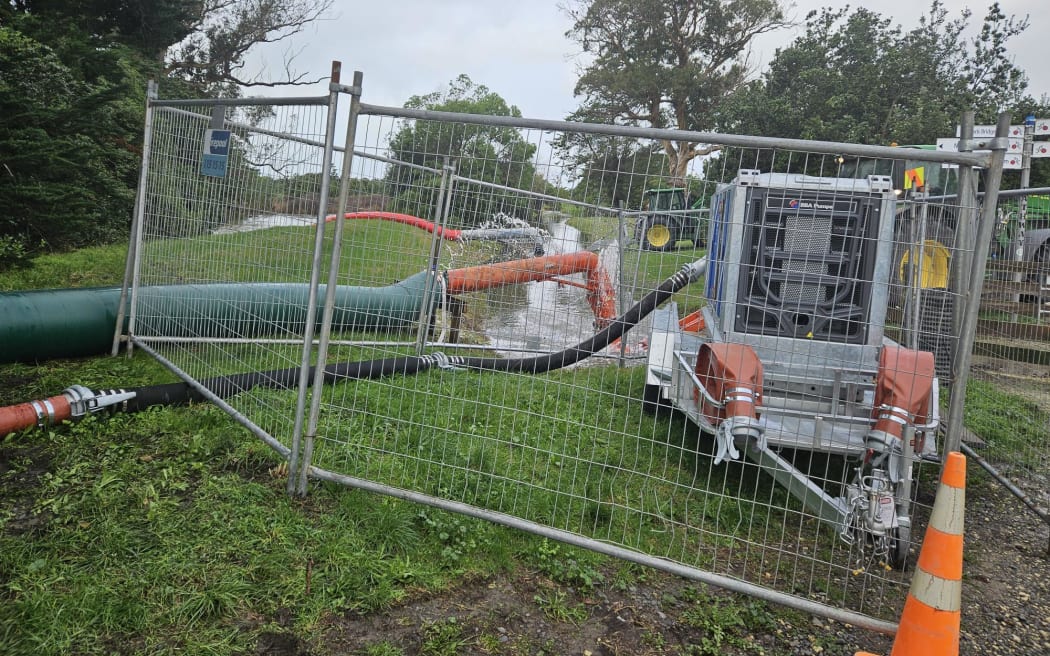 Water pumps at work after flooding in Haumoana, south of the Tukituki River outlet in Hawke's Bay.